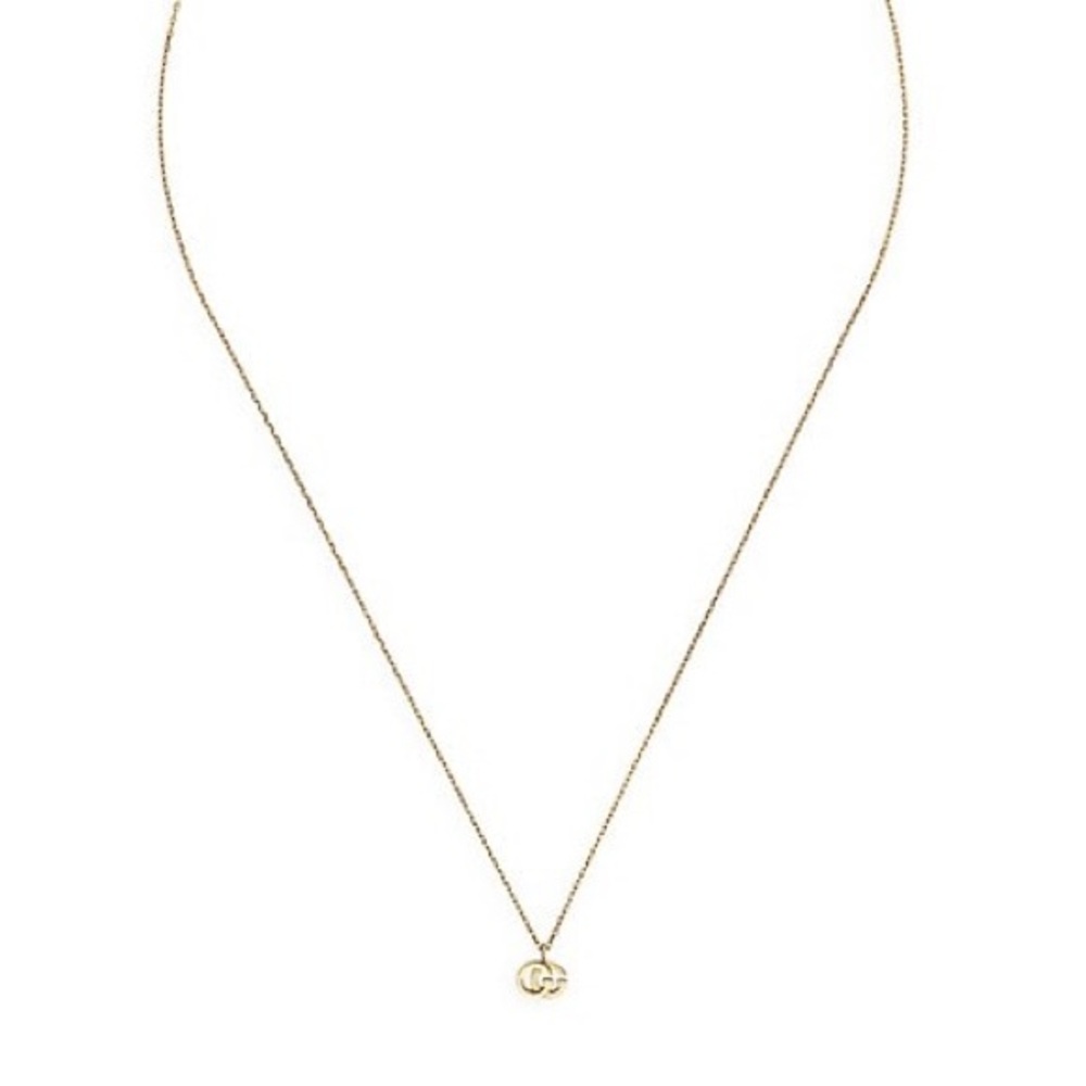 Gucci
18K Yellow Gold & Blue Topaz Necklace